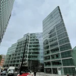 Contemporary office building with a landscaped green frontage
