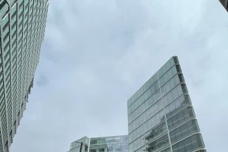 Contemporary office building with a landscaped green frontage